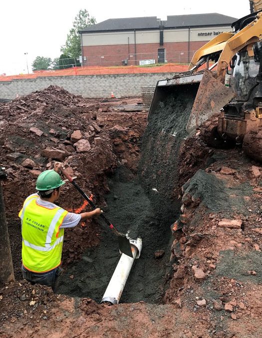 shopping center excavation sewer pipe install
